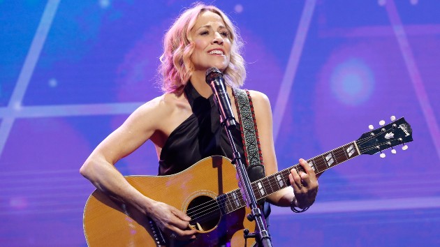 Sheryl Crow will “Soak Up the Sun” this summer in Europe with her boys