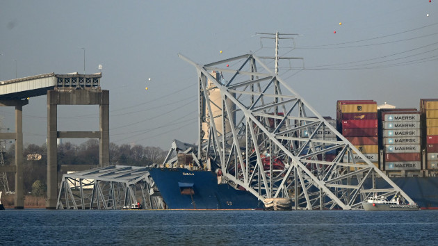 Containers being removed from ship that struck Baltimore bridge