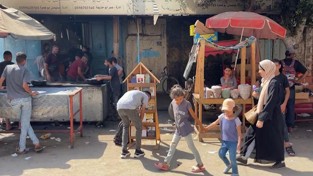 Selling books amid bombs: How a woman is bringing hope to war-torn Gaza through reading