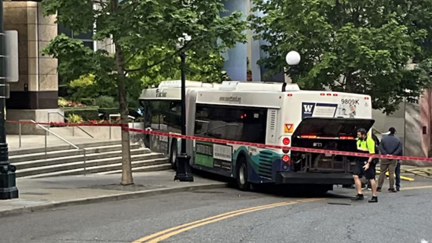 At least 11 injured as bus crashes into Seattle building, fire department says