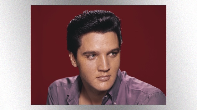 Elvis Presleys legendary blue suede shoes sell for over $150K at auction