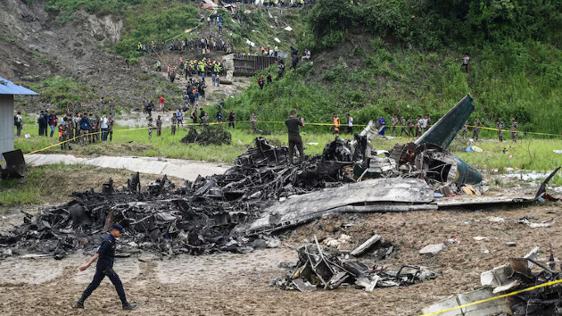 Passenger plane crashes during takeoff in Nepal, killing 18, aviation officials say